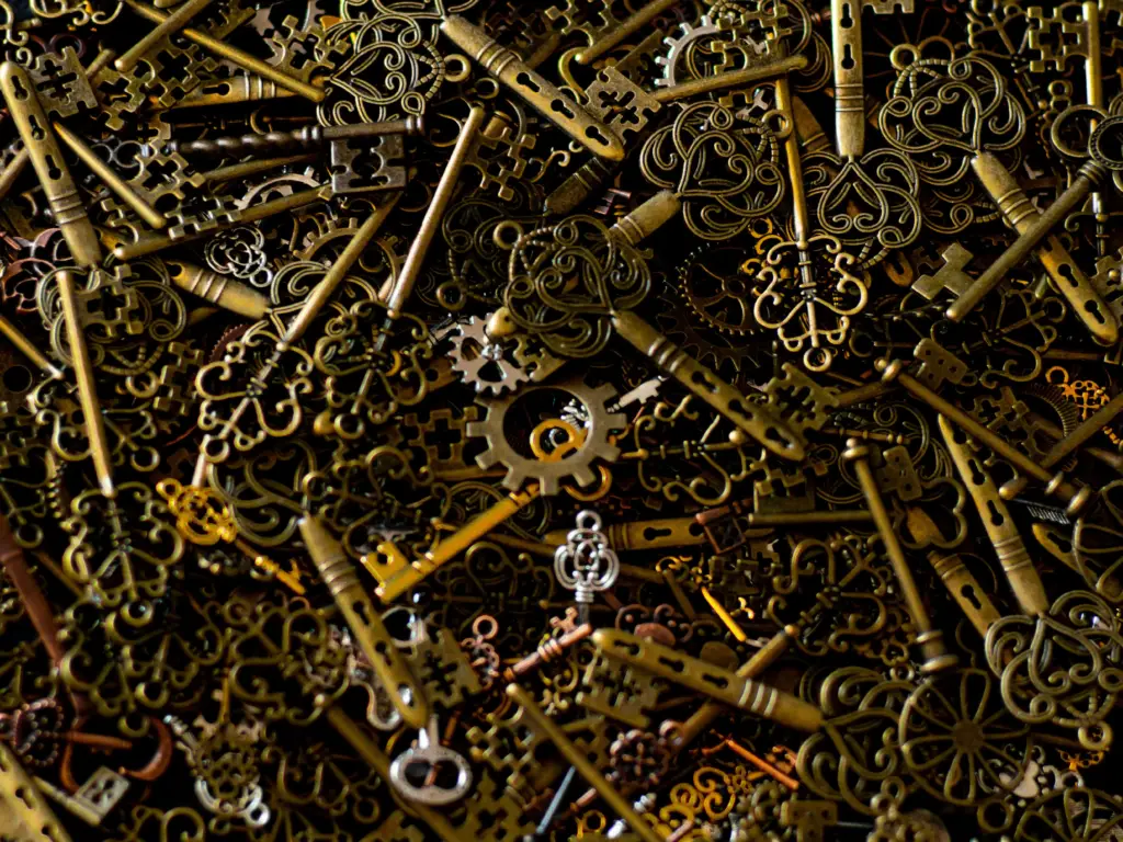 Vintage mechanical keys and gears pile
