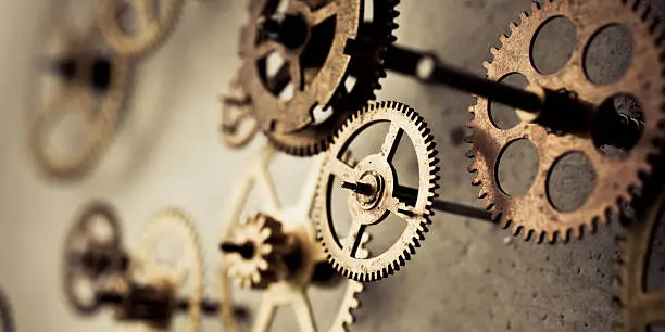 Close-up of interlocking mechanical gears symbolizing focus and creativity in model building for adults.
